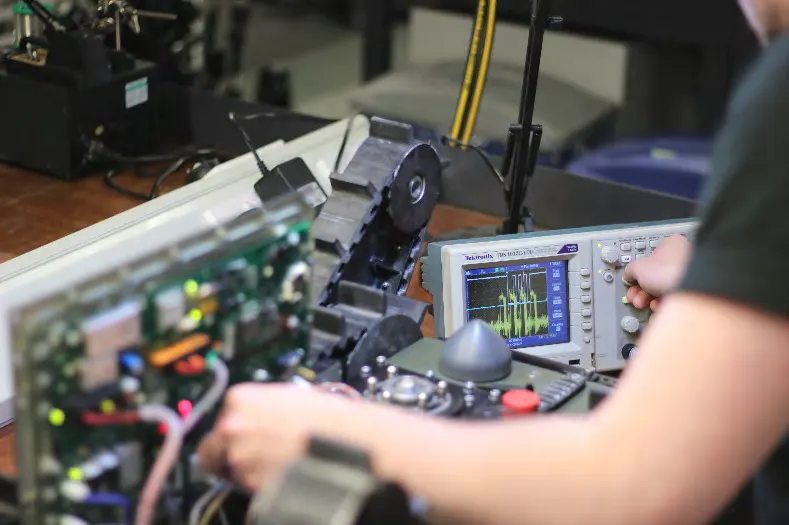 Field Engineering, Army Service — Representative image: equipment testing and repair, a defense systems & procurement project by Saeed Iqbal